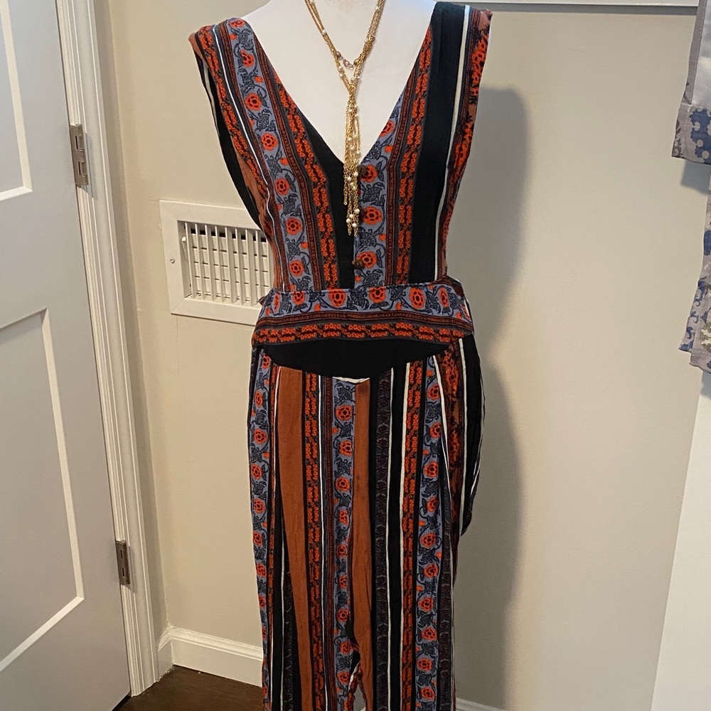 Free People Striped Floral V-Neck Jumpsuit in Black, Rust, and Blue